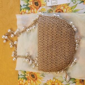 Elegant Brown Woven Bag with Pearl Accents